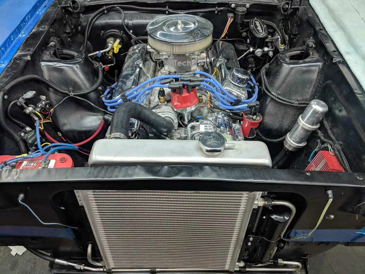 Engine bay with custom hose and line work featured by A Hose Man